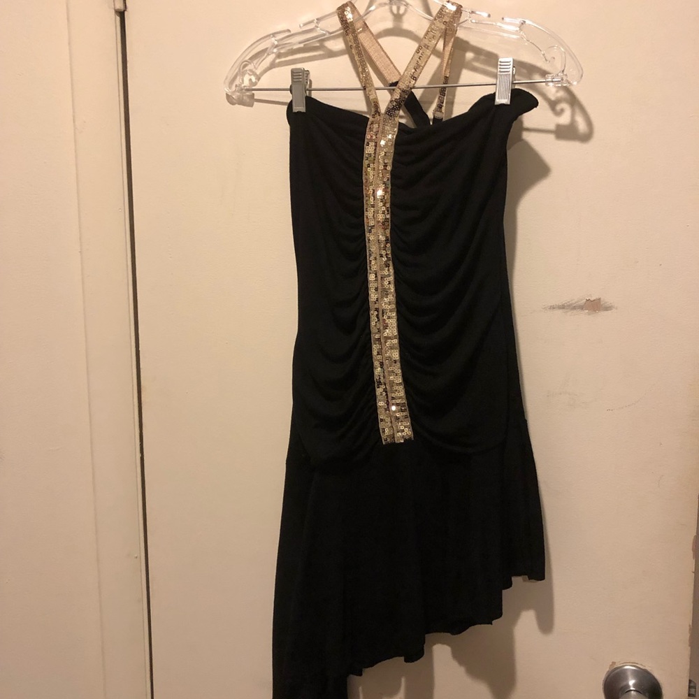 Black halter dress with asemtrecyical hem